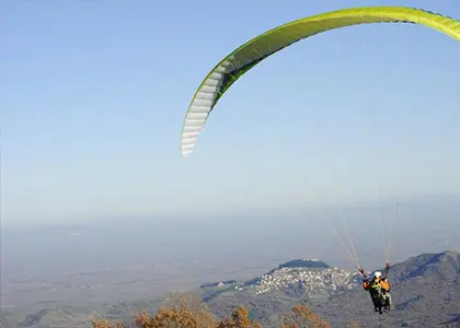 Tandem Paragliding Flight above Lake Plastiras