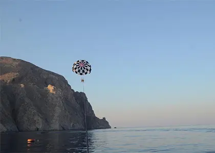Parasailing over Perivolos Beach in Santorini